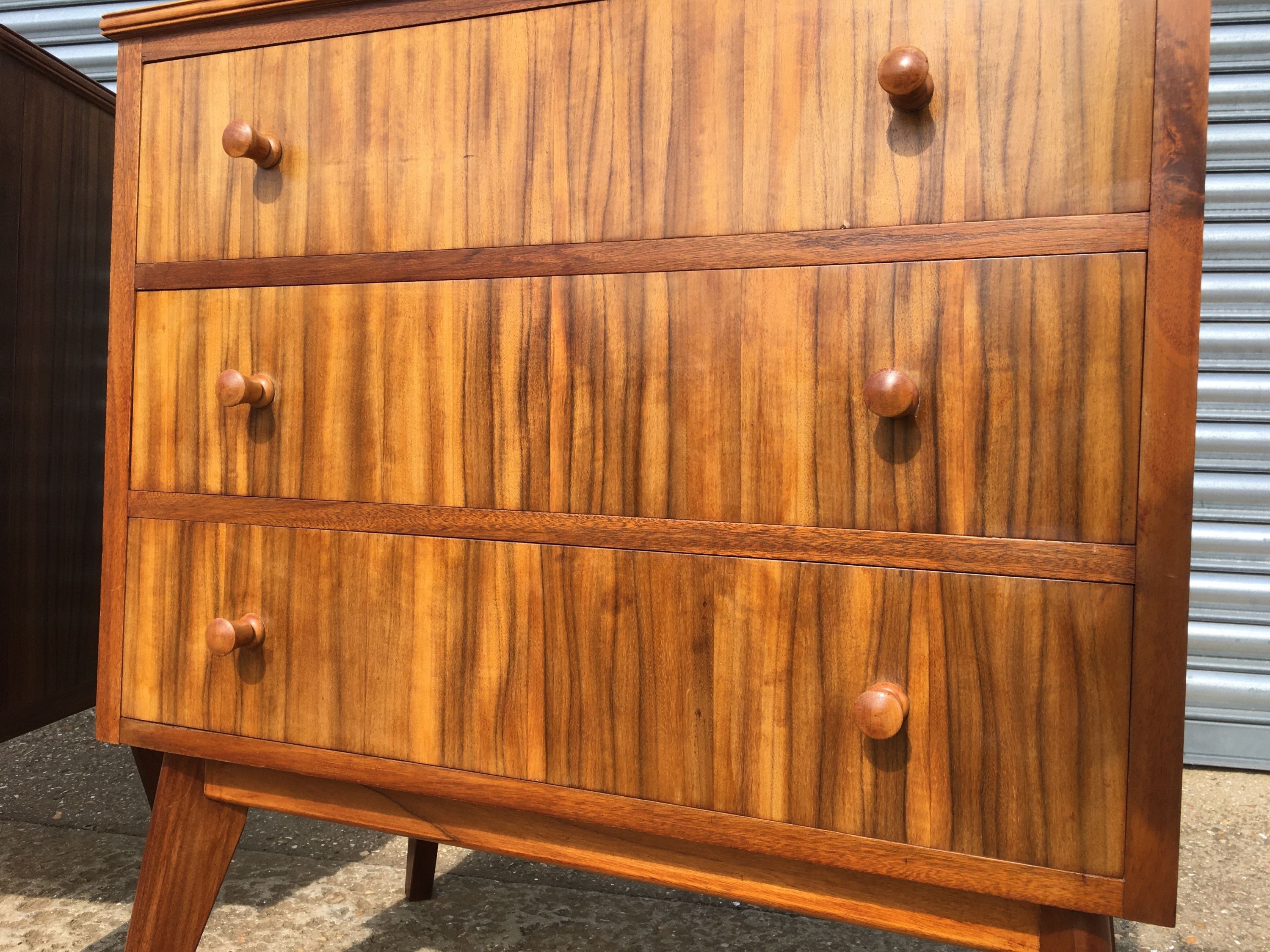 A pair of 1960s Morris Of Glasgow walnut three drawer chests, width 79cm, depth 47cm, height 86cm